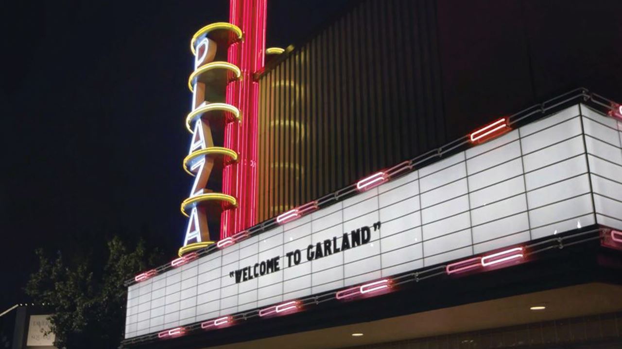 Plaza Theatre with Welcome to Garland sign, Garland TX