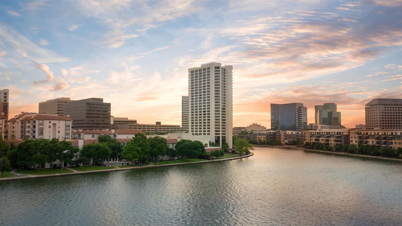 Las Colinas canal waterfront with Williams Square skyline, Irving TX